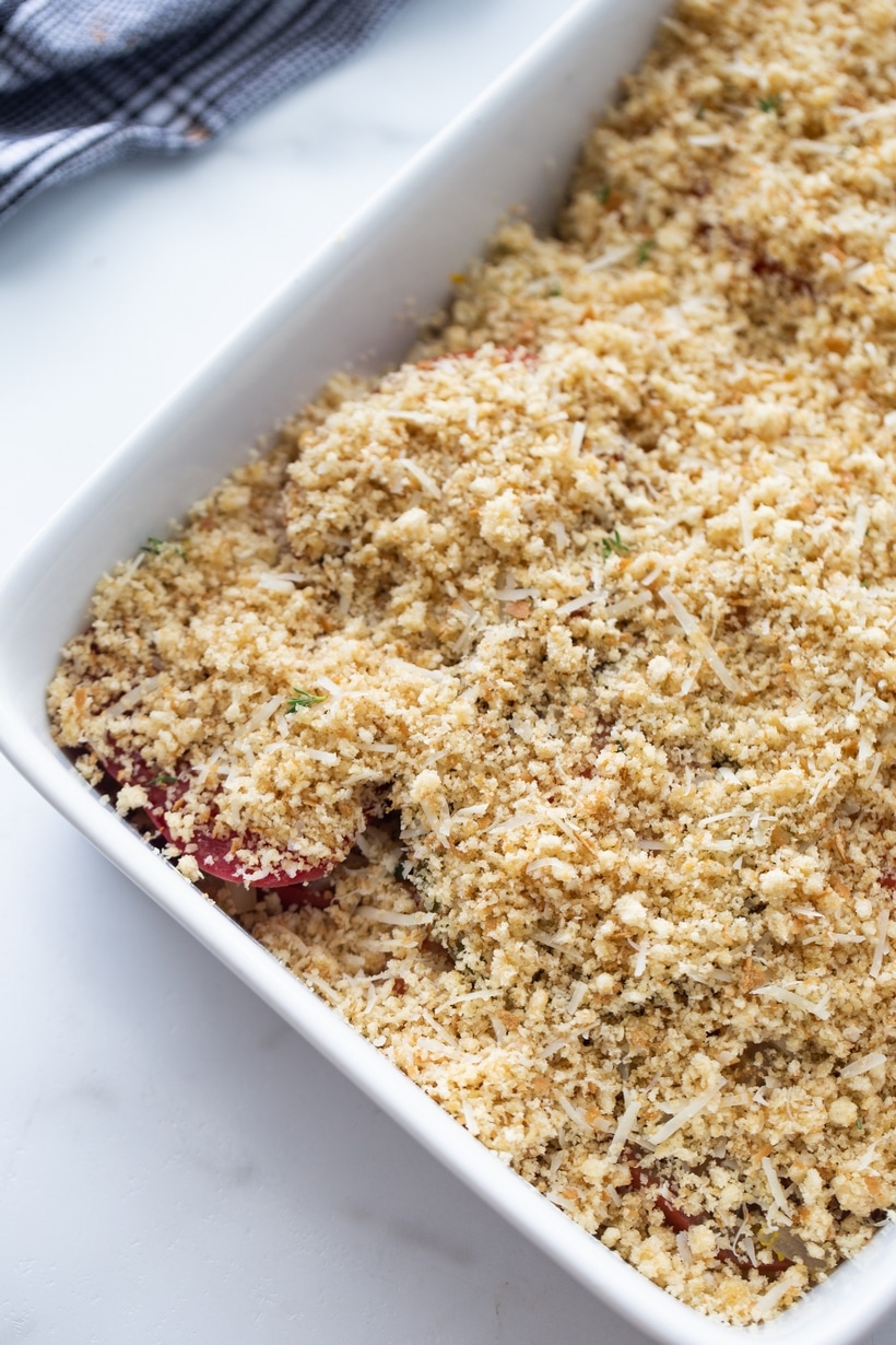 Discover the perfect way to enjoy ripe summer tomatoes with this flavorful tomato gratin. A delicious side dish that pairs well with any meal. tomato gratin