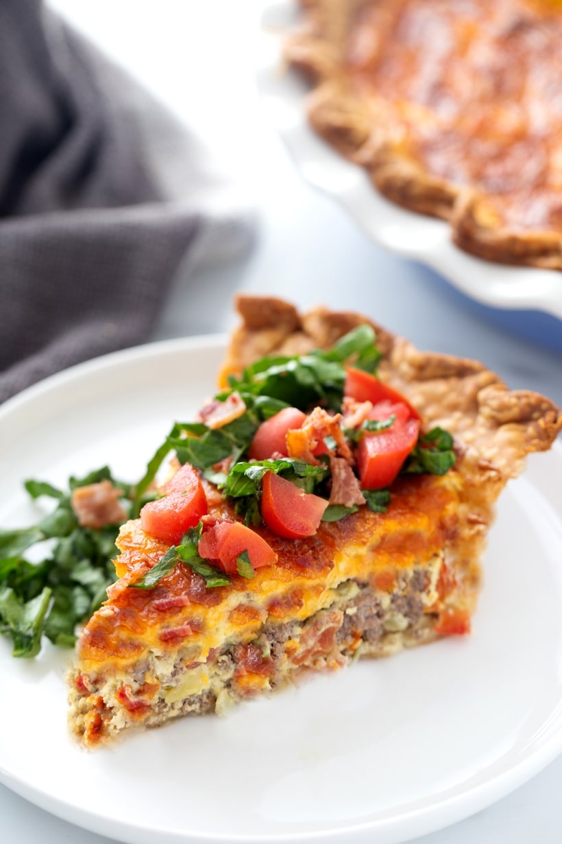 A Cheeseburger Quiche that tastes just like the hamburger you've been craving. Packed with ground beef protein and bacon, this quiche is the best! roadside diner cheeseburger quiche