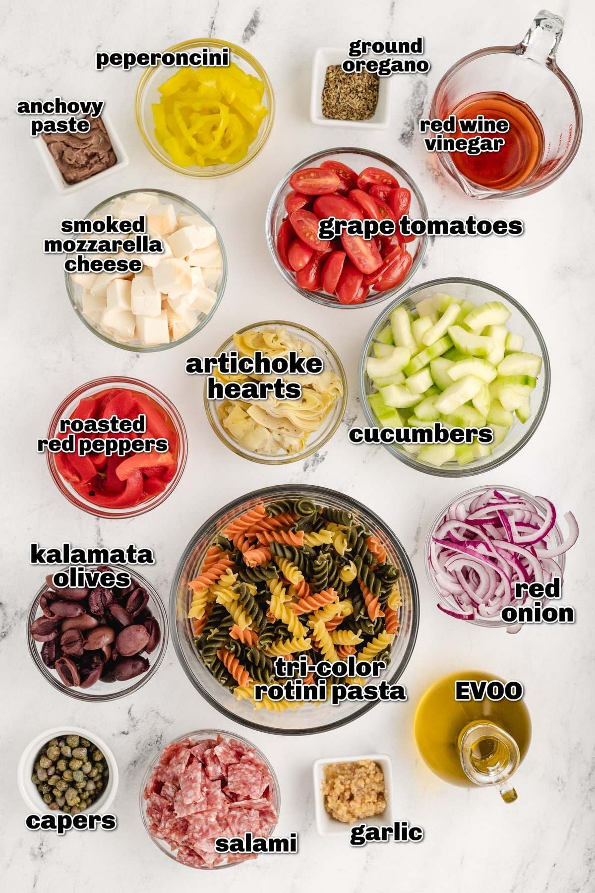 Every bite of this antipasto pasta salad, with its tangy red wine vinaigrette, crunchy cucumbers, salami, Kalamata olives, and especially the smoked mozzarella, offers something different and tastes amazing. ingredients