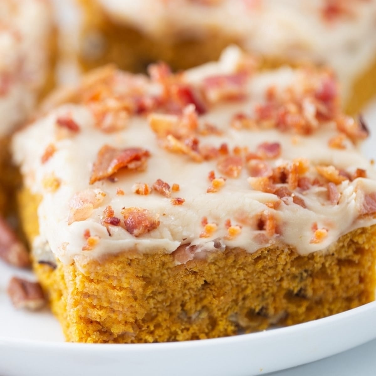 These pumpkin caramel bars are an unforgettable salty-sweet combo, with bacon on top for crunch and drippings in the pumpkin layer to pack in even more flavor. caramel and pumpkin bars