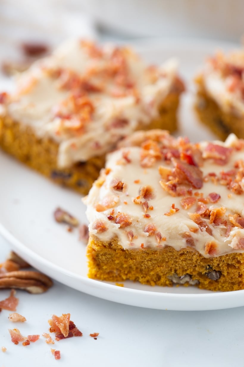 These Pumpkin Caramel Bars with Bacon are the salty-sweet dessert combination you have been craving. With bacon sprinkled on top and drippings in the pumpkin layer you are in for a treat. Bars with pumpkin