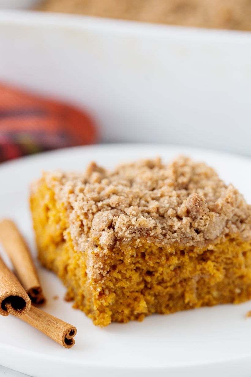 This Pumpkin Coffee Cake recipe tastes like fall. A cozy and generous mix of spices – cinnamon, ginger and nutmeg, along with a rich crumb topping make this coffee cake a perfect, seasonal treat. Pumpkin Crumb Cake
