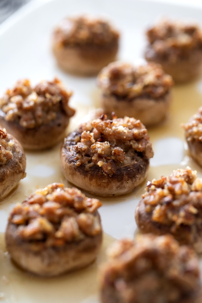 Simple, elegant and full of flavor, these Pork Stuffed Mushrooms will be devoured instantly after hitting the appetizer table. pork mushrooms