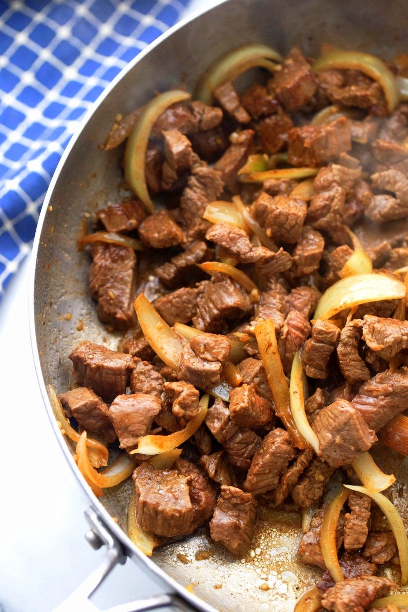 Vietnamese-Style Beef - an easy and absolutely delicious weeknight meal you need to feed your family! All the flavors, both sweet and savory, of garlic, pepper and lime come shining through. garlic and pepper beef