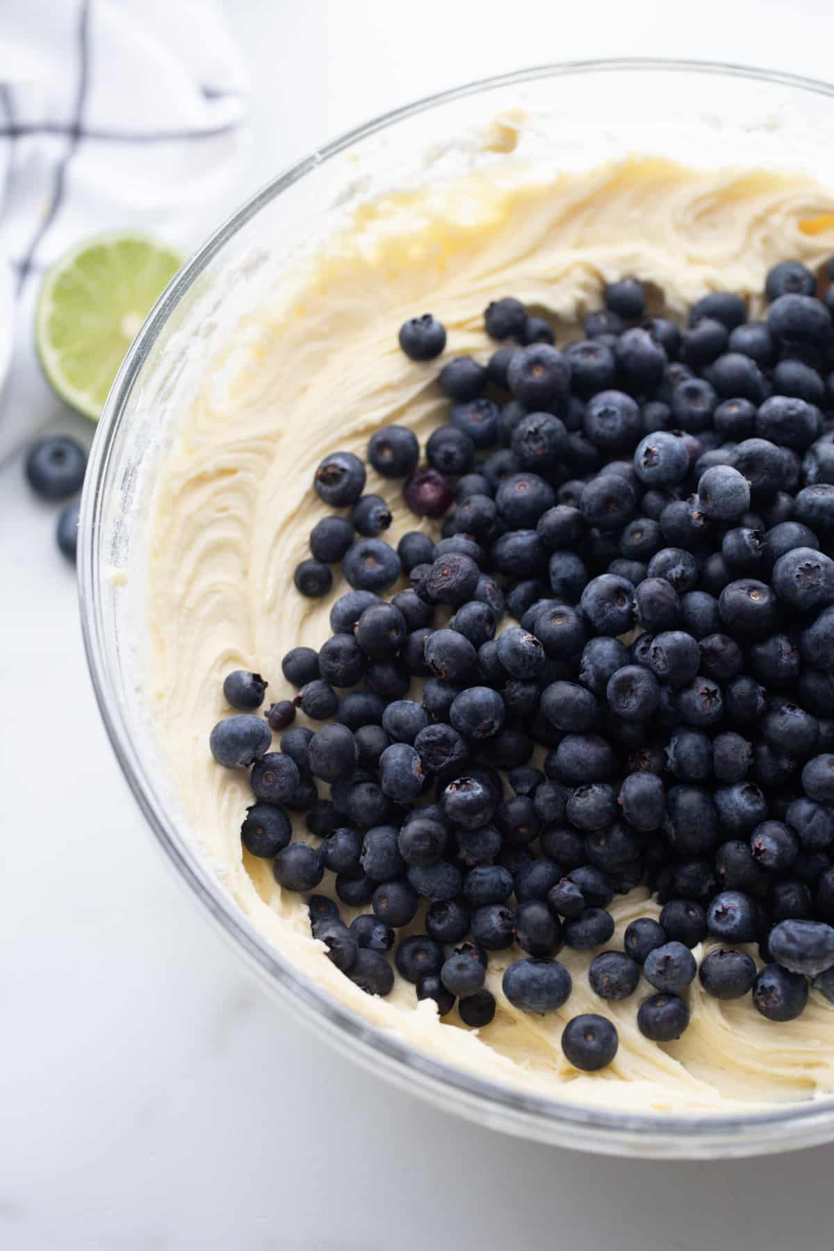 Blueberry-Lime Pound Cake batter with blueberries Bowl of batter with fresh blueberries piled on top, just before folding them in.