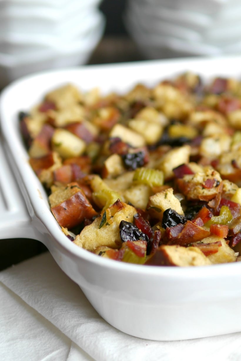Baked Pretzel Bread Stuffing in White Dish Golden-brown pretzel bread stuffing in a white baking dish