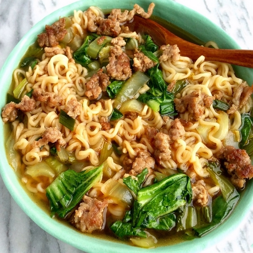 A life-changing Gingery Pork Ramen recipe because honestly, it's going to rock your world. The ground pork turns this ramen into a hearty meal with a pop of flavor you've never quite tasted before. This pork ramen is one of the first meals my son requests when he returns home from college because it's that good, not to mention so easy to make. Pork ramen in a green bowl.