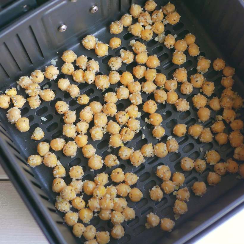 Crunchy on the outside and creamy on the inside, these Air Fryer Chickpeas are the perfect snack on their own, or toss them on top of salads or into a snack mix. Making these air fried chickpeas is a quick and easy way to achieve the perfect chickpea crispness. chickpeas in the air fryer