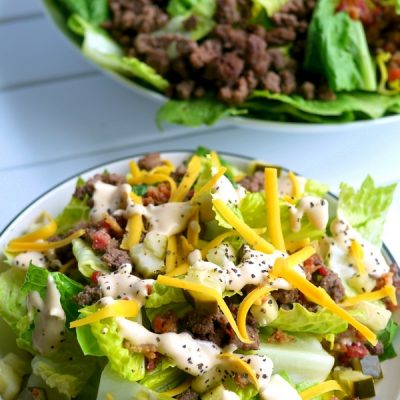 If you are trying to cut sugar out of your diet, this Low Carb Bacon Cheeseburger Salad Recipe is the perfect meal for you. Who needs the bun anyway? You'll be surprised how much this flavorful salad mimics your favorite burger. A gluten-free, keto-friendly meal that makes a healthy lunch or dinner.