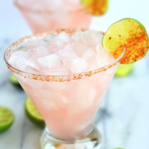 The petal pink color of this Icy Hibiscus Margarita is alluring, but it's the sweet, tangy and refreshing flavor that will have you asking for a second pour. #noblepig #margarita #cocktail #hibiscus