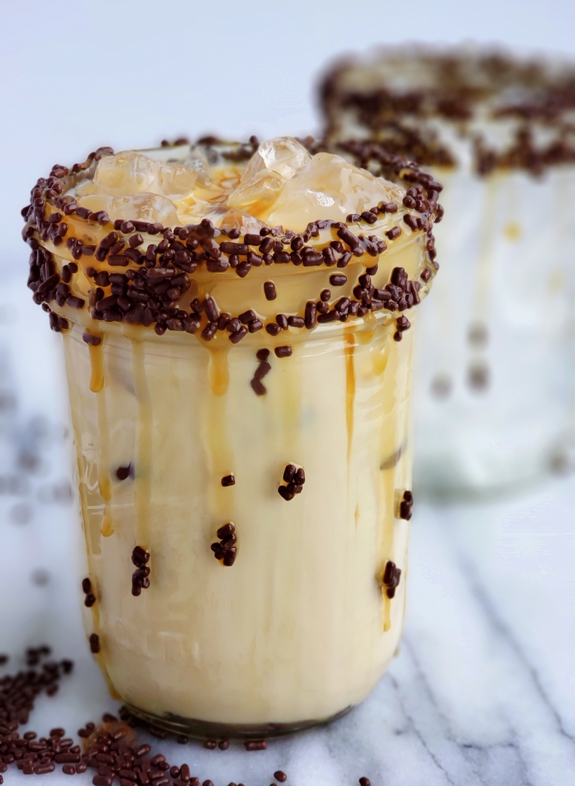 Save yourself a ton of money by preparing this Copycat Starbucks Iced Caramel Macchiato at home. It's so easy to put together with just a few basic ingredients. Starbucks Iced Caramel Macchiato
