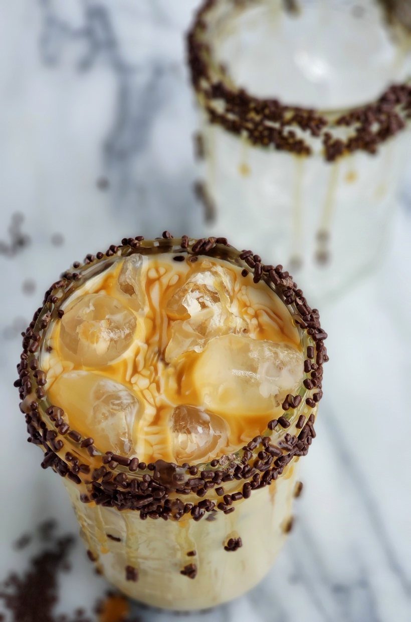 Save yourself a ton of money by preparing this Copycat Starbucks Iced Caramel Macchiato at home. It's so easy to put together with just a few basic ingredients. Copycat Starbucks Iced Caramel Macchiato