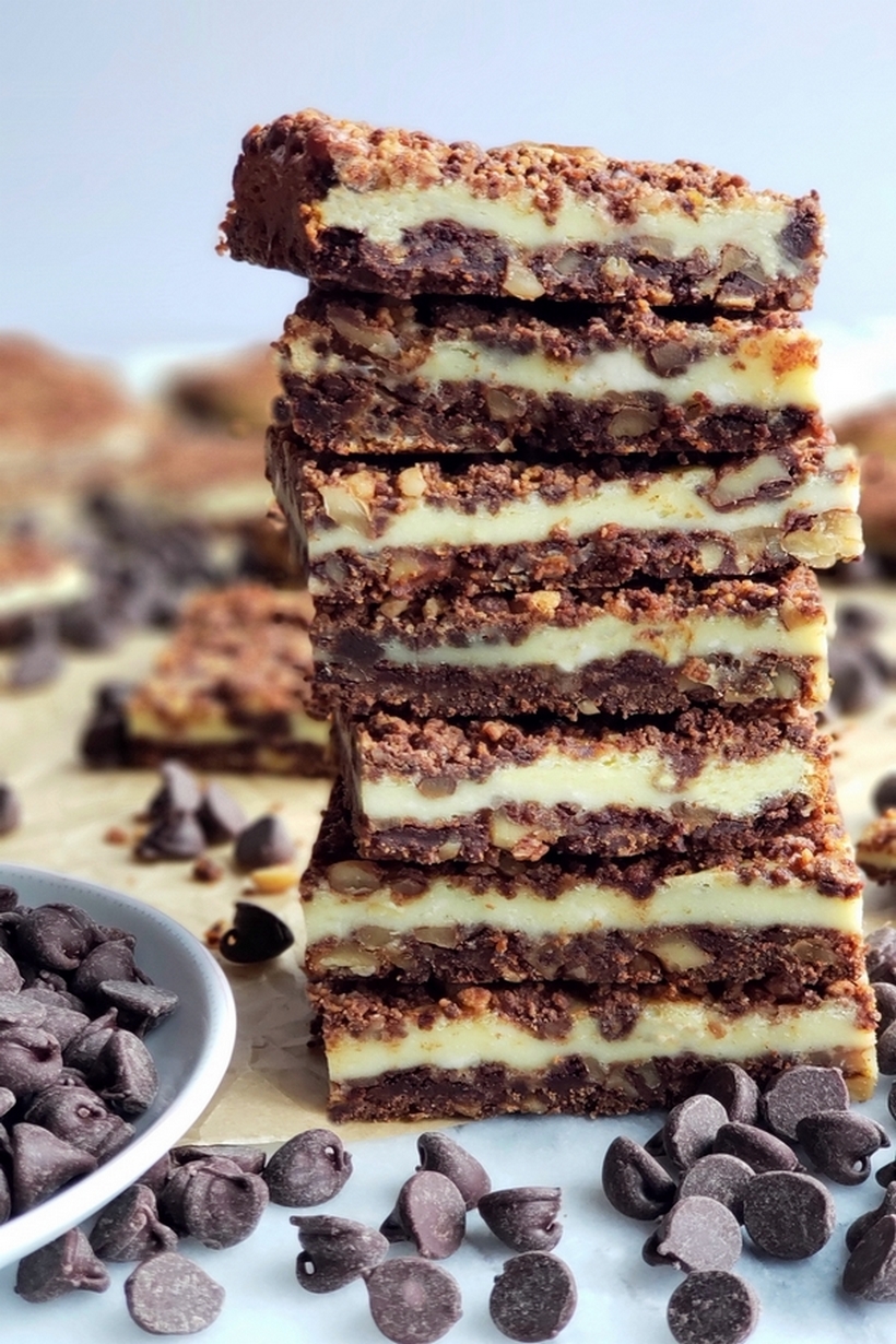 Perfect for any occasion, these Chocolate Cream Cheese Bars feature a unique chocolate graham cracker crust and topping, with a creamy middle layer. #creamcheesedessert