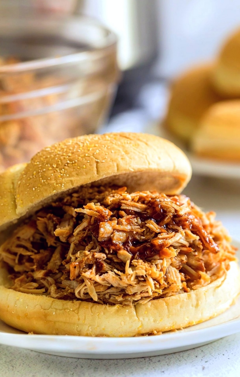 Instant Pot Pulled Pork with barbecue sauce is made to be piled high on your favorite bun. This flavor-packed pulled pork is fall-apart tender and will be ready in no-time for dinner tonight. Instant Pot Shredded Pork