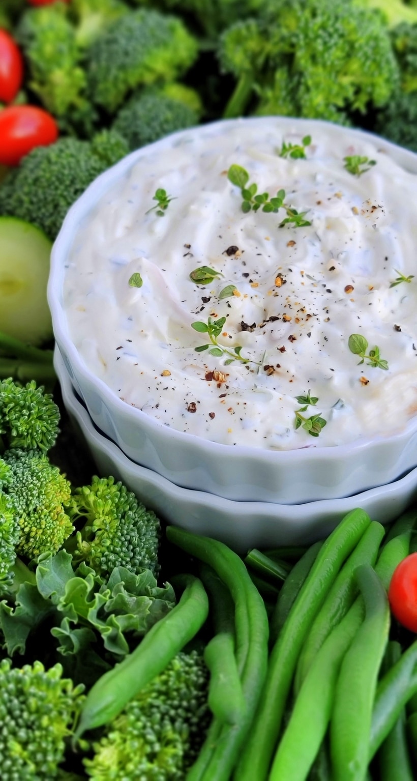A simple Christmas Wreath Vegetable tray made from your favorite veggies and served with a tasty, addictive onion dip! Onion dip with vegetables