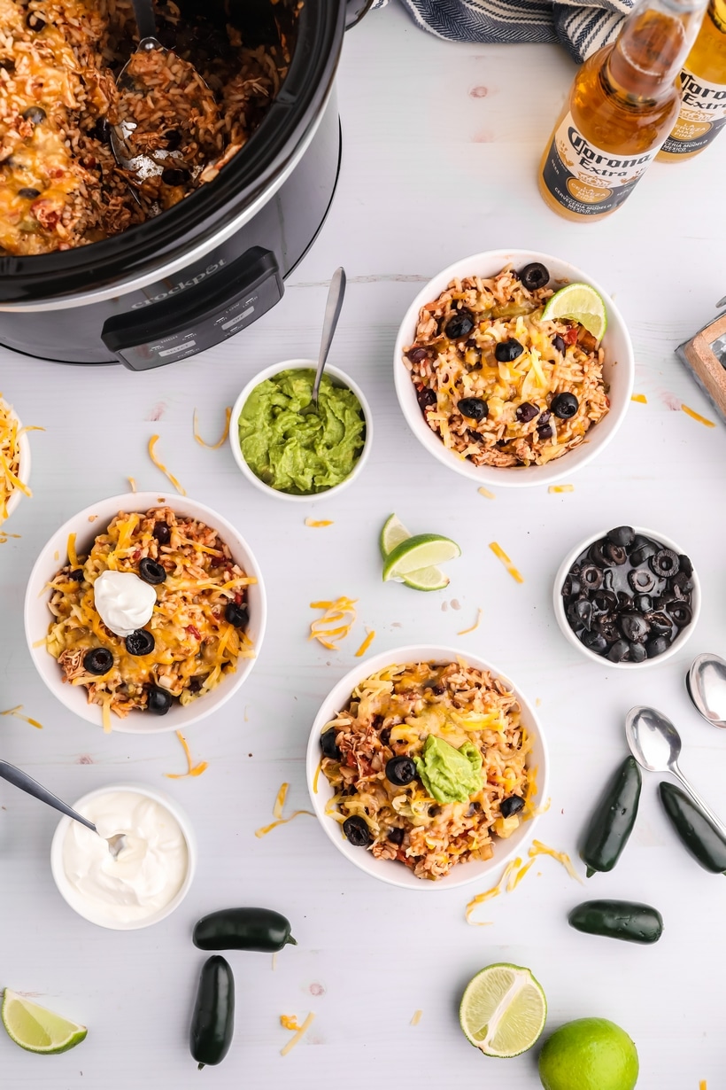 Burrito bowls overhead three burrito bowls filled with a crockpot
