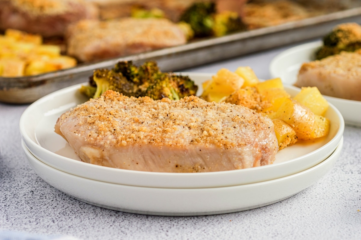 pork chops in oven for easy dinner ideas boneless pork chop recipes on a sheet pan with roasted potatoes and broccoli