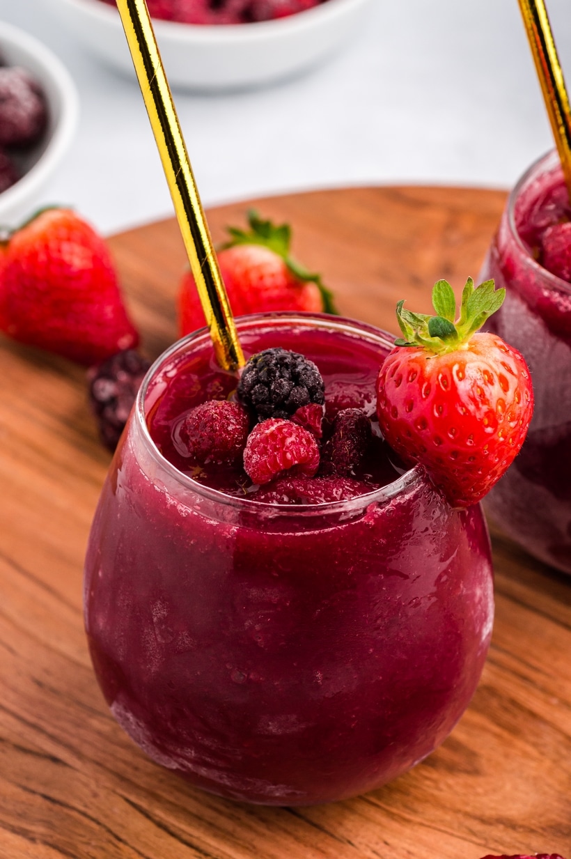 Red wine slushie starting to melt—ready to drink Red wine slushie beginning to melt in a glass on a warm surface