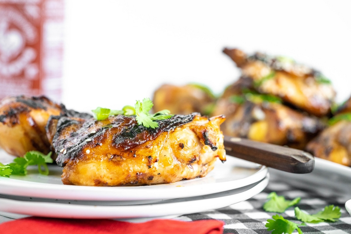 Grilled spicy honey garlic chicken that's a perfect balance of sweet heat, just the way I like it. Trust me, this chicken will be your go-to grilling recipe. honey garlic chicken