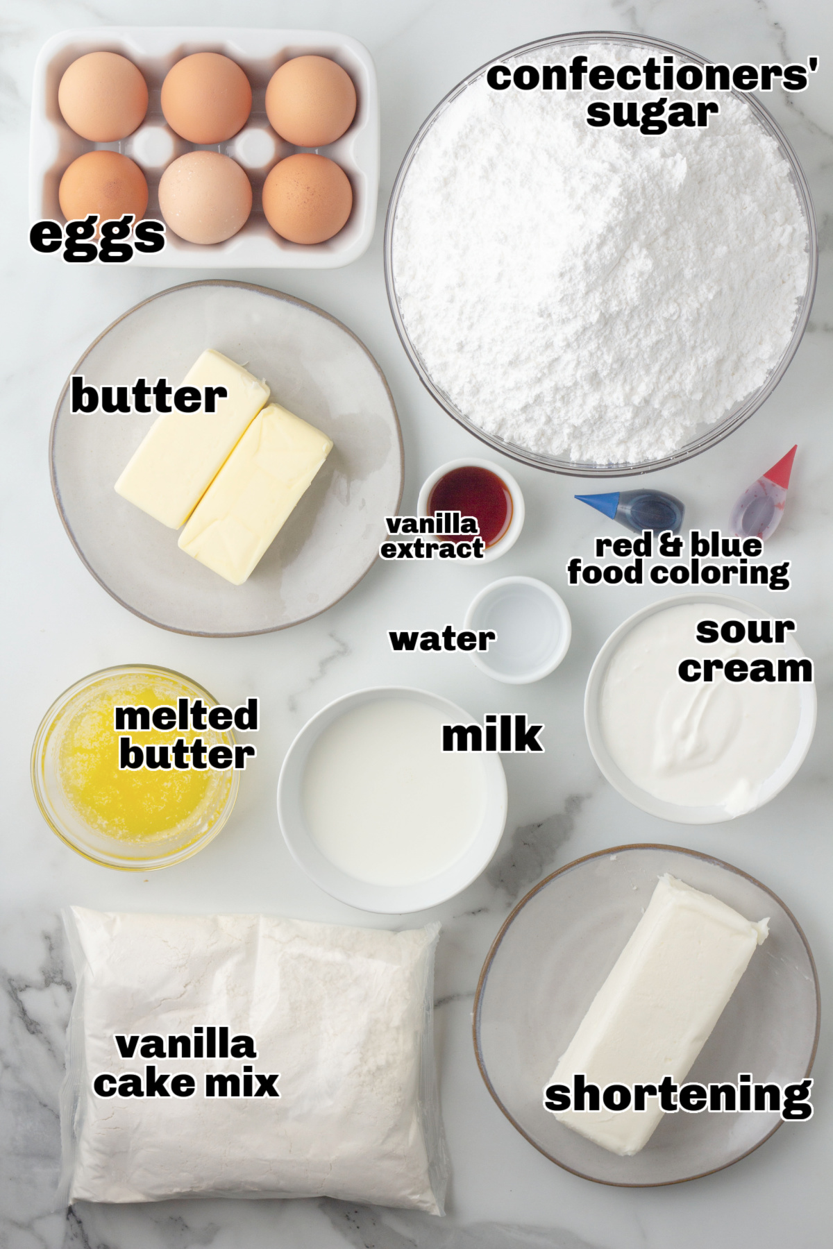 Ingredients for buttercream flag cake including cake mix, sour cream, eggs, butter, shortening, food coloring, and confectioners’ sugar.