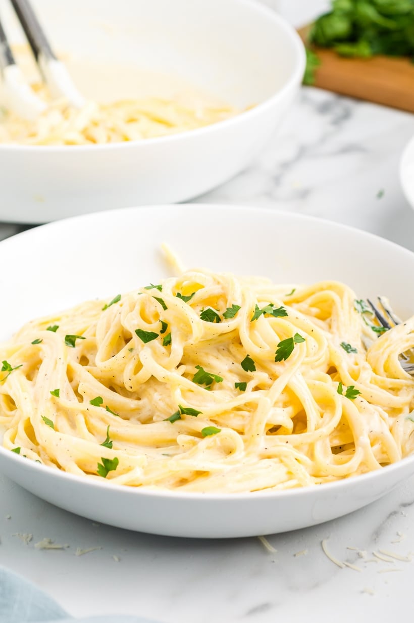 The smoothest Fettuccine Alfredo you'll ever taste. As the cheese melts into the liquid and coats the pasta, you'll understand why the most basic of pasta recipes is truly one of the best! best fettuccine alfredo