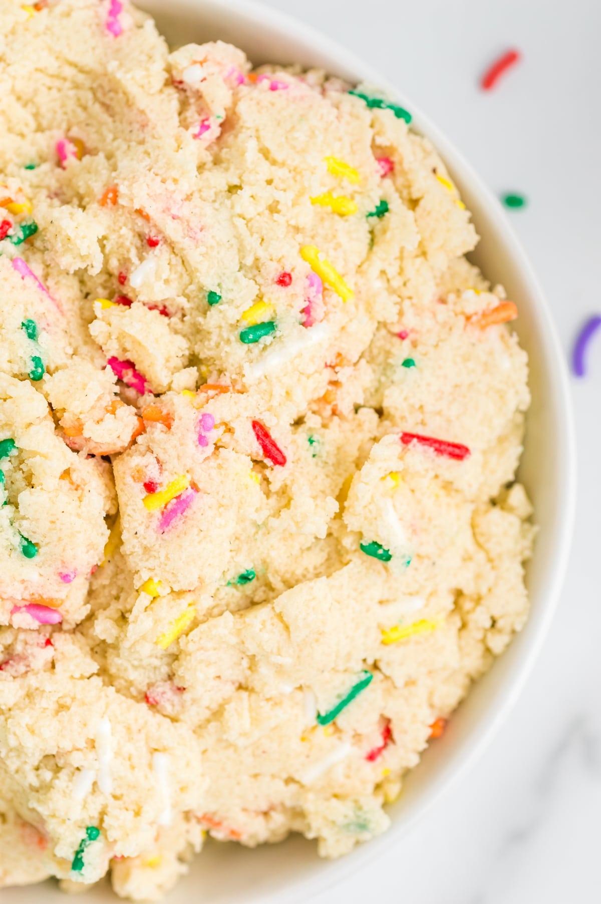 Edible Sugar Cookie Dough close-up A close-up of the finished sugar cookie dough in a mixing bowl, smooth and ready to eat.