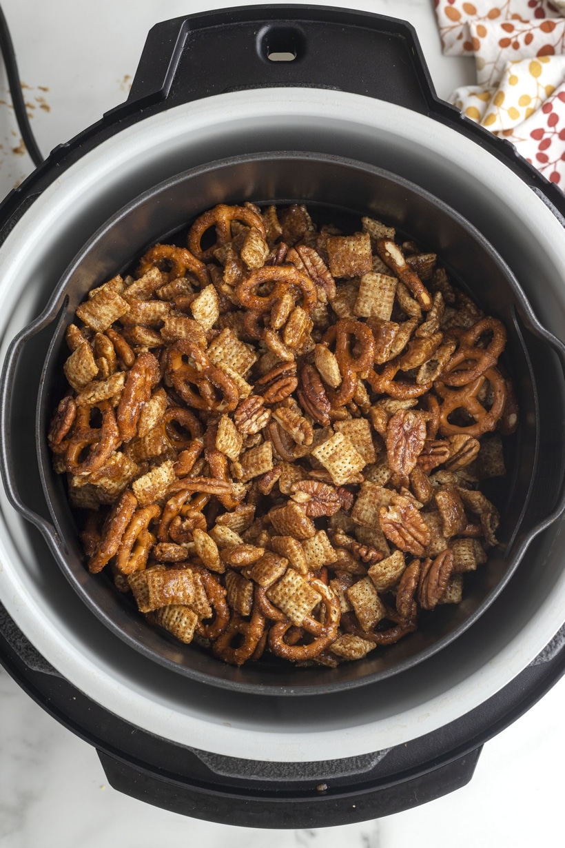 This air fryer pumpkin spice Chex mix is a sweet, crunchy snack with all the cozy holiday flavors. It's simple to toss together, and the air fryer does the rest. air fryer chex mix