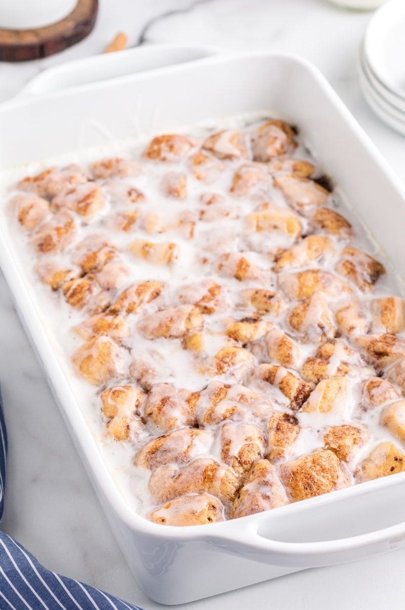 A quick and easy breakfast casserole without any of the fuss. This cinnamon roll breakfast bake is sweet, rich and full of flaky layers in every bite. cinnamon roll casserole