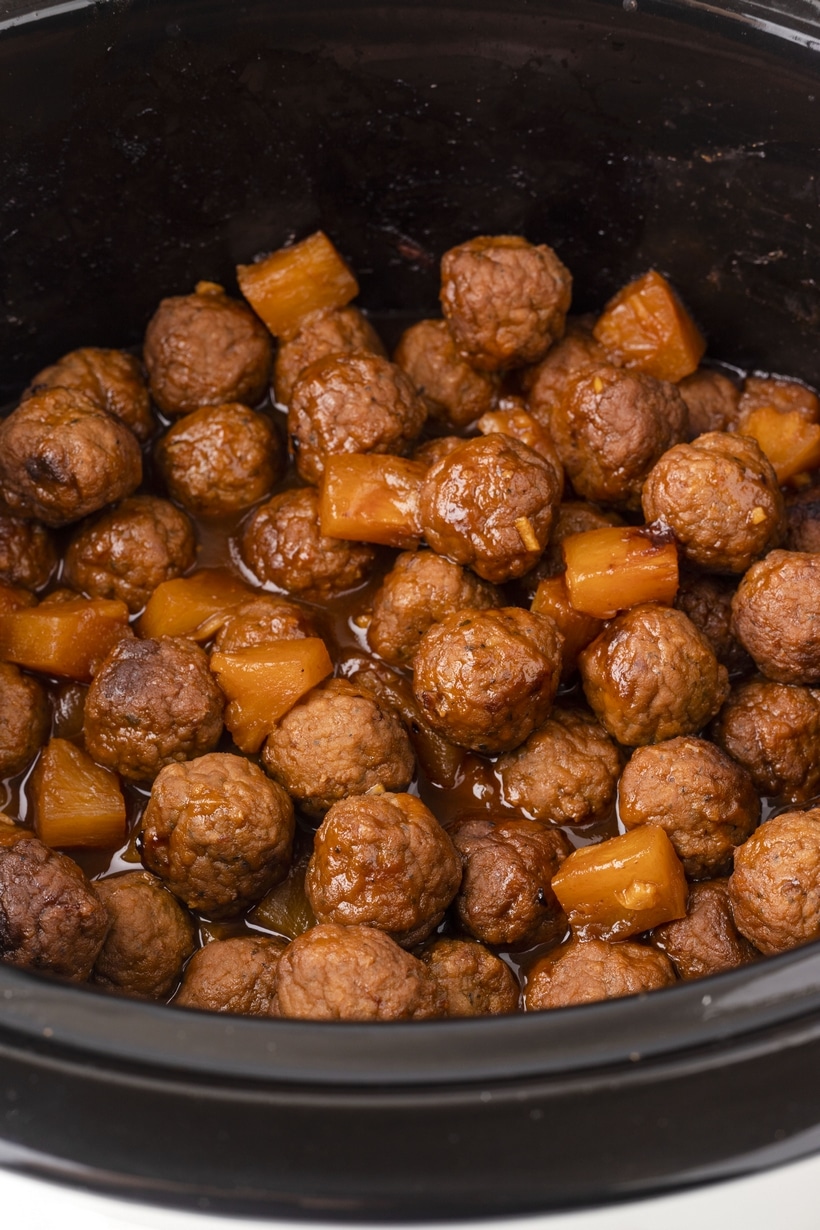 Slow Cooker Hawaiian Meatballs served simply for an easy dinner idea. Slow Cooker Hawaiian Meatballs in a crockpot, ready to enjoy as a flavorful dinner.