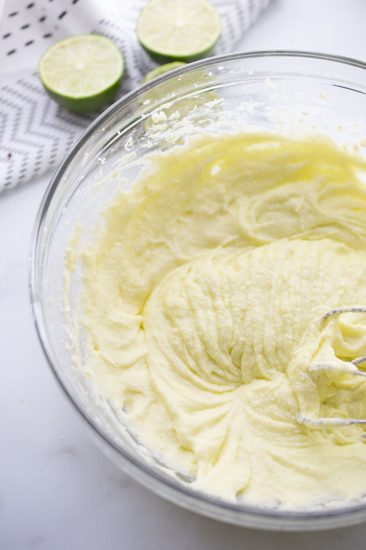 Wet ingredients for cupcake batter in a mixing bowl before flour is added