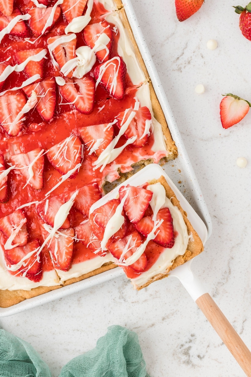 Making strawberry pizza is such a fun process. It’s basically a bright, colorful take on a super easy, light, and airy fruit galette. Seriously, one bite of this gorgeous dessert and you'll be planning to make it again in no time. strawberry pizza with cookie crust