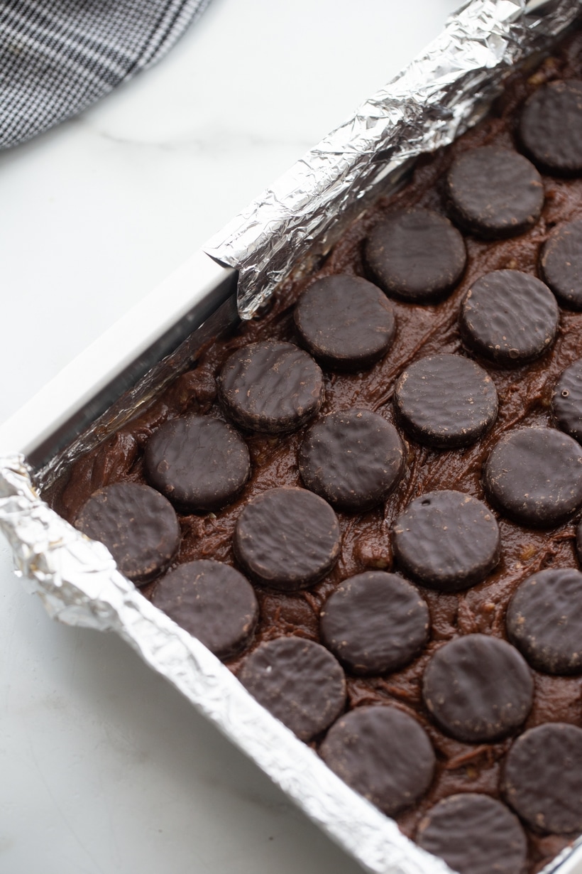 Peppermint Patty Brownies are the gooiest, darkest, most fudge-like, candy bar brownies you could ever hope for this holiday season. york peppermint patties