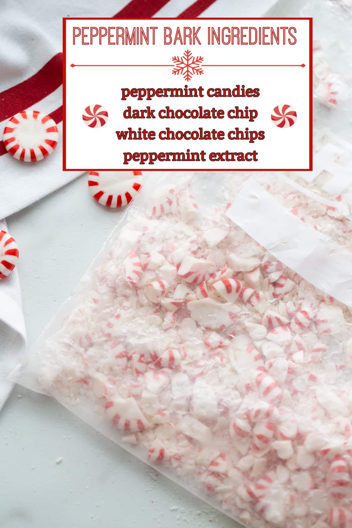 Ingredients for double chocolate peppermint bark laid out, including dark and white chocolate chips, peppermint extract, and crushed peppermint candies.