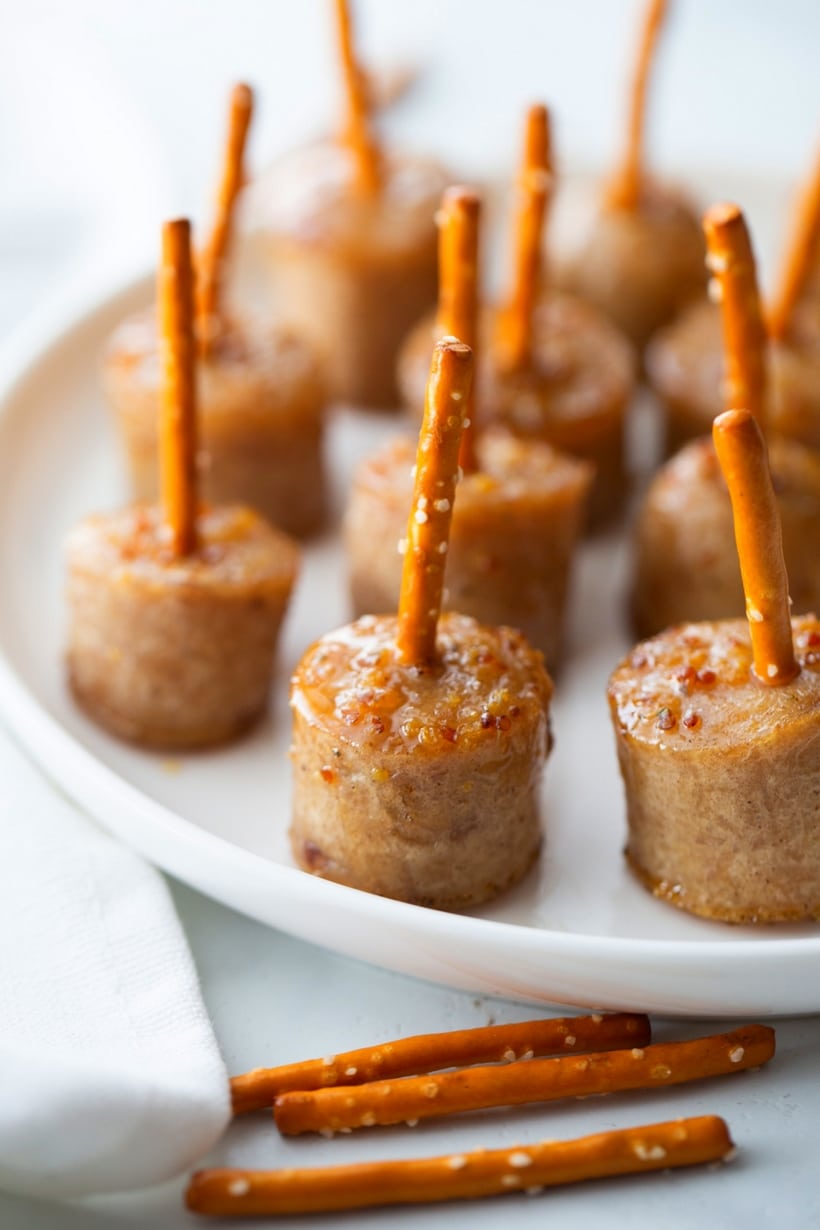 The perfect bite-sized party starter with edible toothpicks make the perfect passed appetizer! sausage bites recipe
