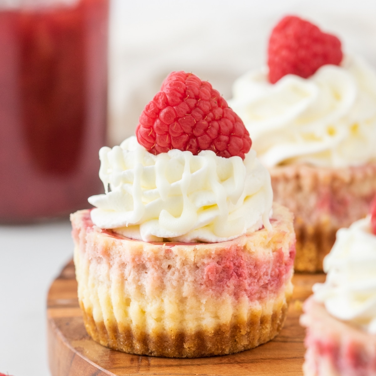 mini white chocolate raspberry cheesecakes