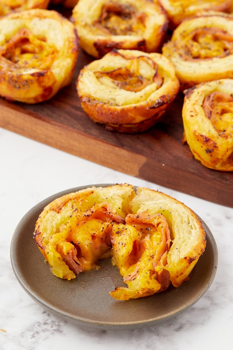 Ham and cheese pinwheels with a sweet and savory glaze brushed on top.