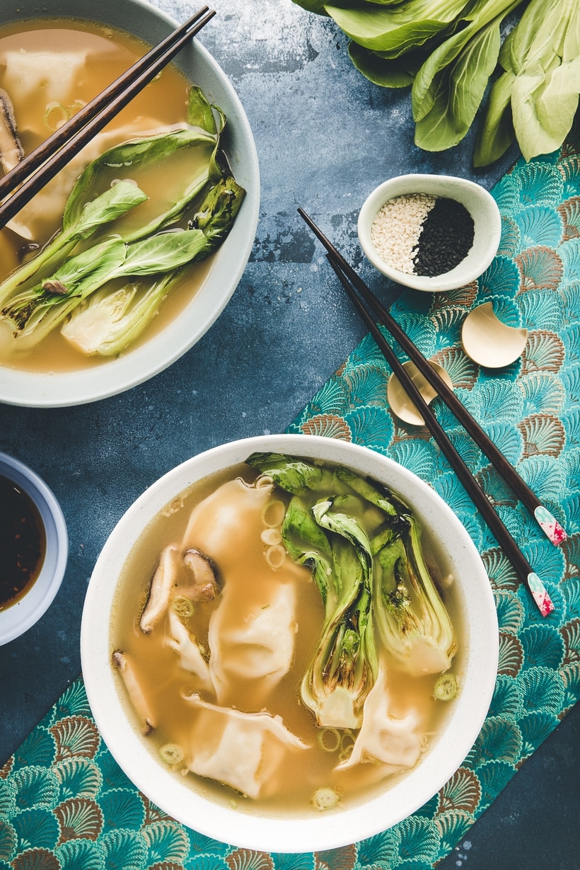 Simple Wonton Soup recipe for dinner. wonton soup base with an overhead view of two bowls.