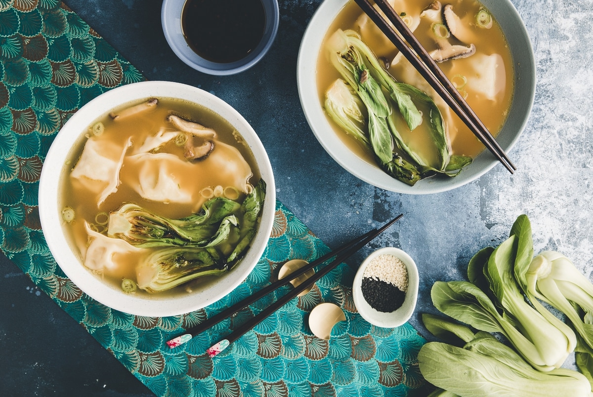 Easy wonton soup recipe. Two bowls of wonton soup .