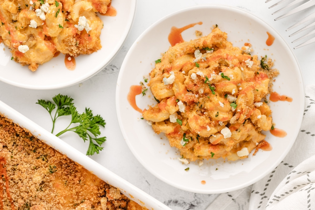 Two platefuls of buffalo chicken mac and cheese.