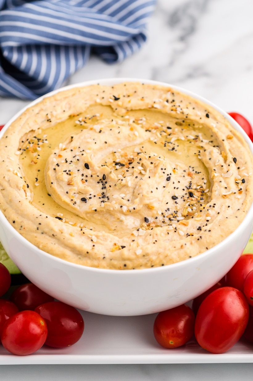 Ditch the pre-packaged options and make this simple, crowd-pleasing, homemade hummus recipe. Creating hummus from scratch is a breeze and I promise the flavor is far superior to the store-bought deli selections. Pair it with your preferred crackers or assemble it as part of a fresh vegetable platter. how to make hummus