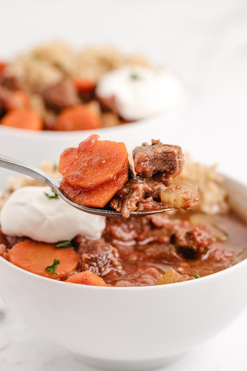 You're going to love the rich and robust flavors of this Slow Cooker Beef and Tomato Stew, a timeless classic that has been slow-simmered to what tastes like perfection! This tomato-rich stew is true comfort food and the ideal dish to savor on a snug evening. It's the perfect slow cooker dinner for the fall season. tomato based beef stew