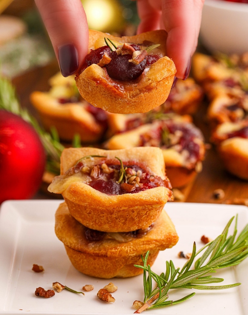 These cranberry Brie bites bring together gooey cheese, tart cranberry, and a hint of rosemary—all wrapped up in golden, buttery dough. Simple, festive, and always a hit. brie bites recipe