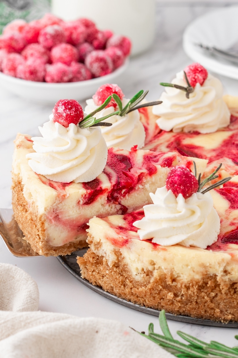 A slice of this creamy Cranberry Cheesecake is worth rushing through dinner so you can get straight to dessert. slice of cranberry cheesecake