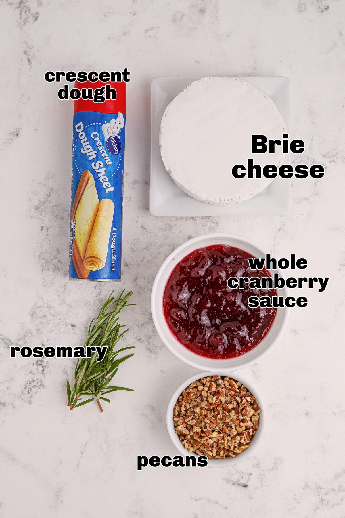 These cranberry Brie bites bring together gooey cheese, tart cranberry, and a hint of rosemary—all wrapped up in golden, buttery dough. Simple, festive, and always a hit. ingredients