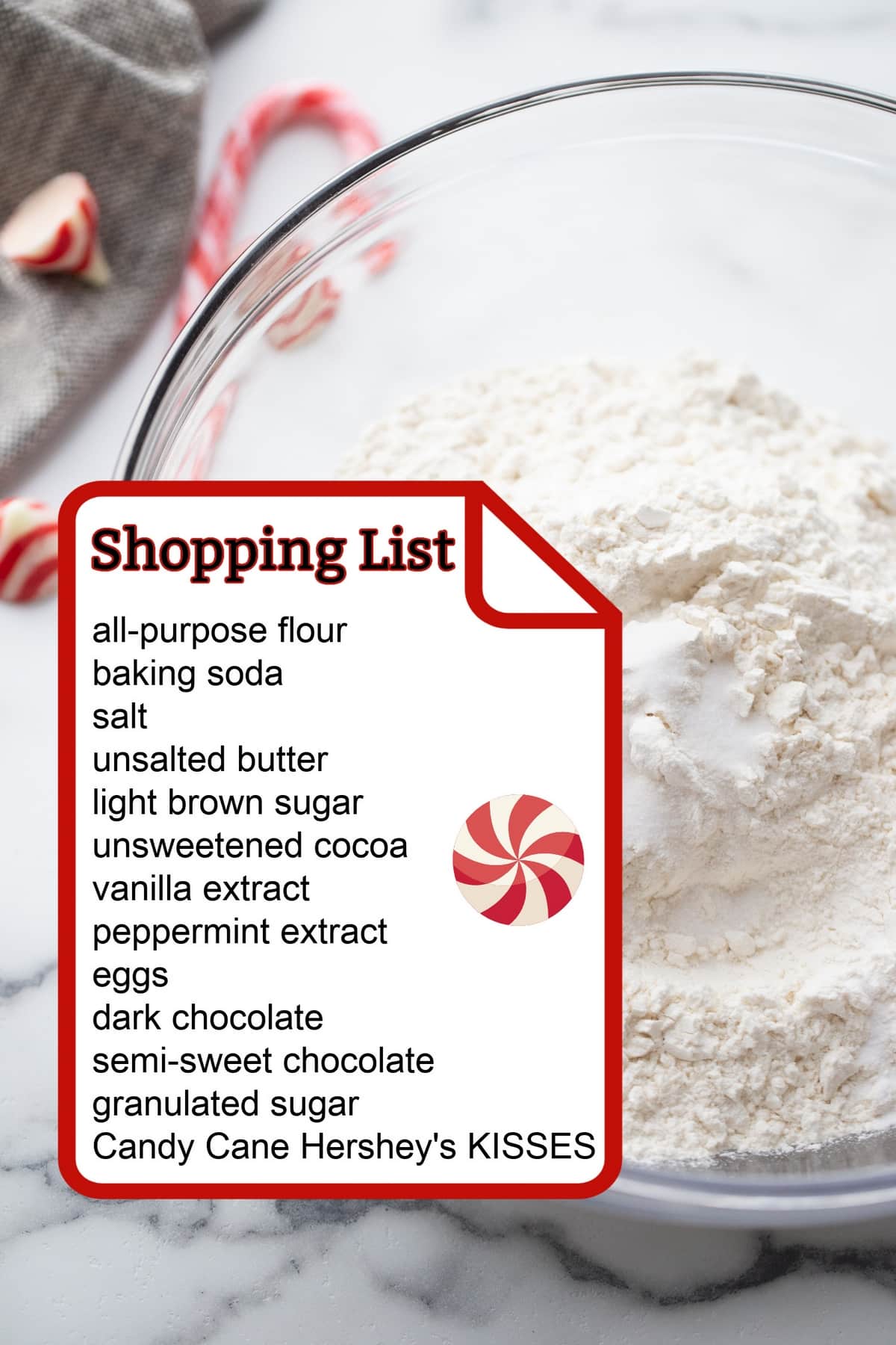 Dark chocolate and peppermint ingredients for cookie baking. A bowl of flour with a shopping list of ingredients.