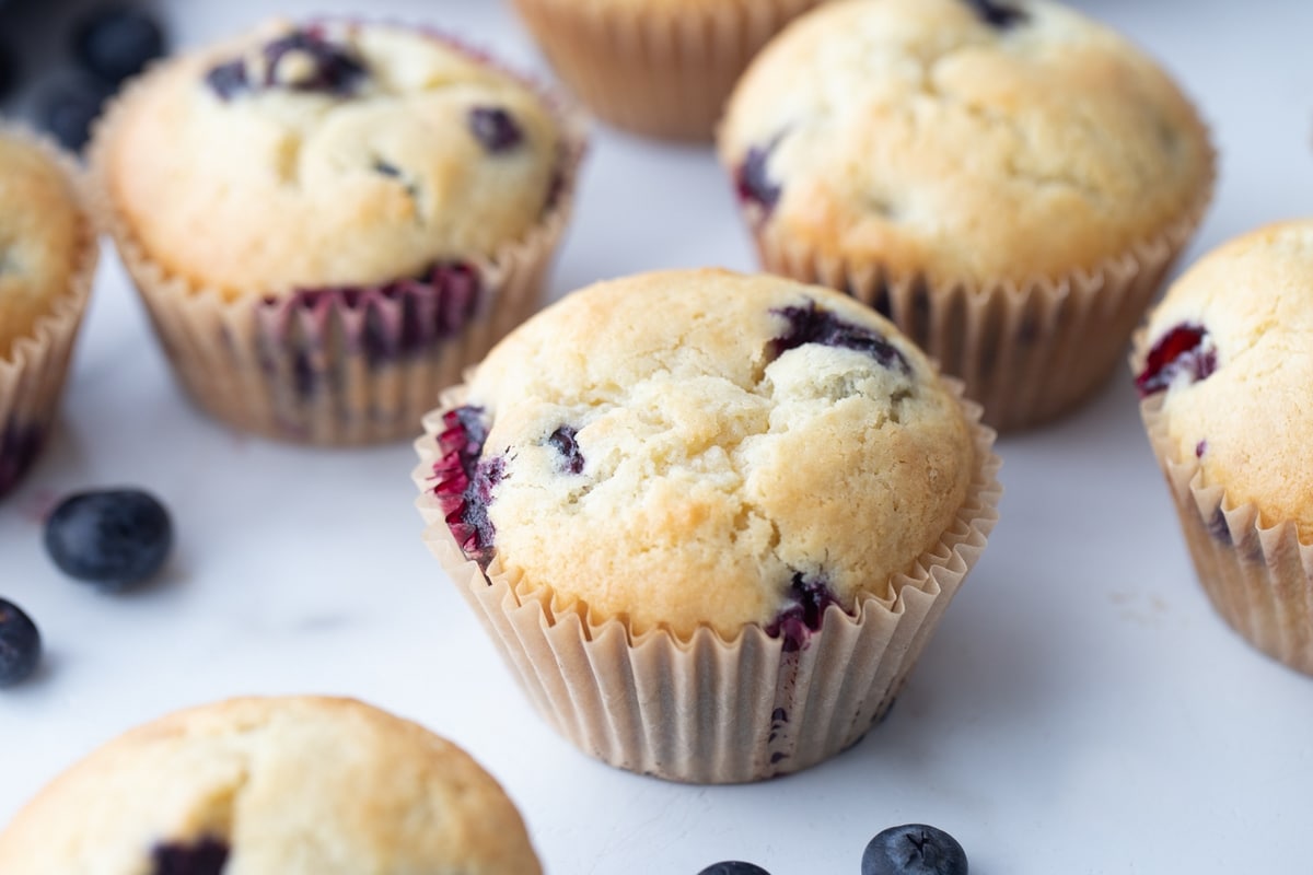 Sour Cream Blueberry Muffins in paper liners sour cream blueberry muffins with paper liners