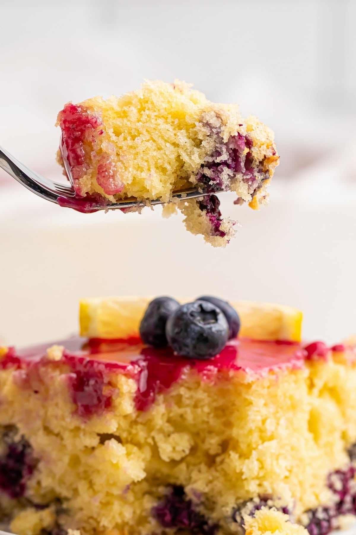 Treat yourself to a slice of heaven with my homemade blueberry lemon cake. It's the perfect balance of sweetness and citrus. lemon blueberry glazed sheet cake 9 x 13