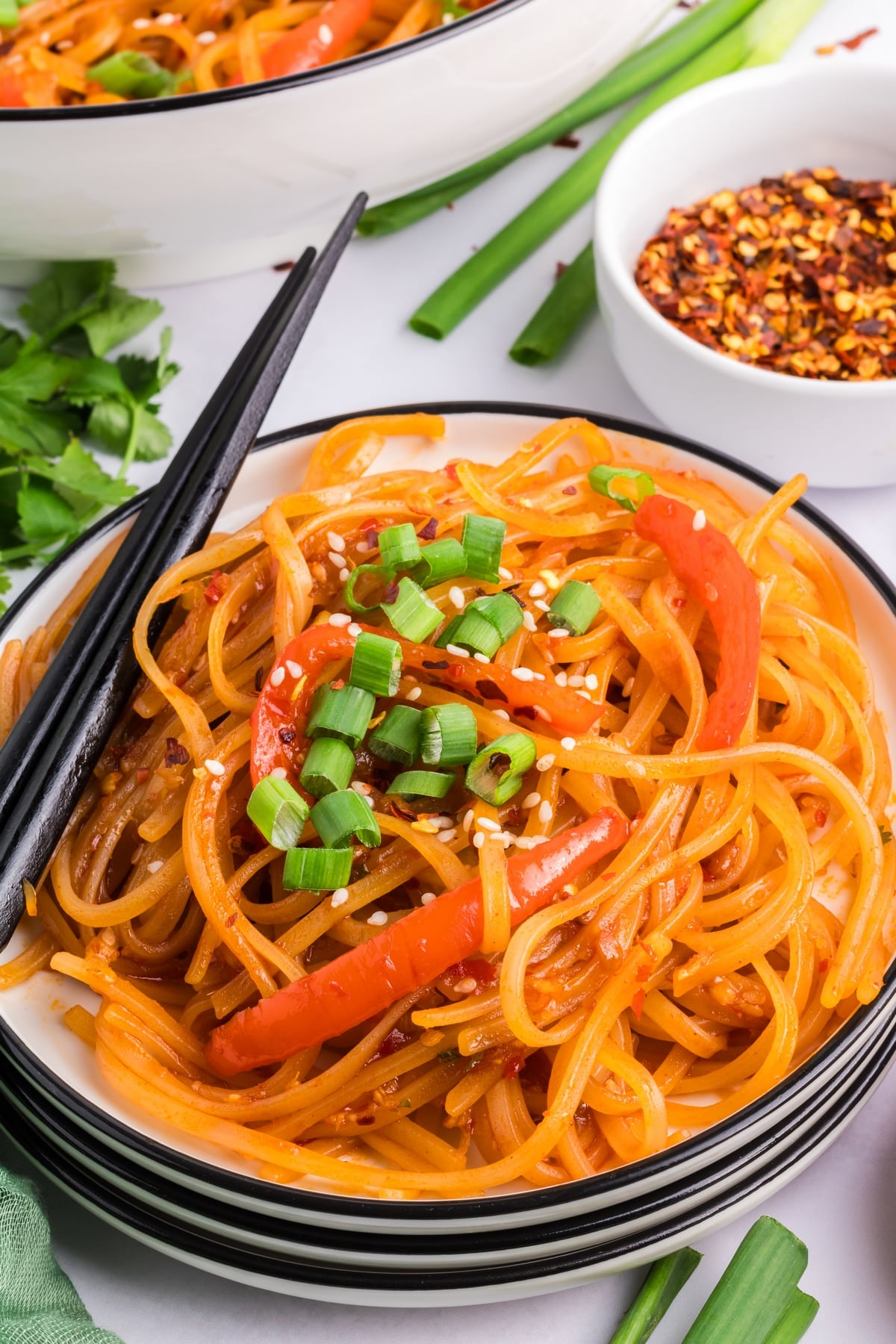 Chili garlic noodles, a quick and delicious side dish recipe tossed in a spicy-fragrant chili garlic sauce. Perfect for a busy weeknight and packed with so much flavor. I love making this noodle dish. chili garlic noodles