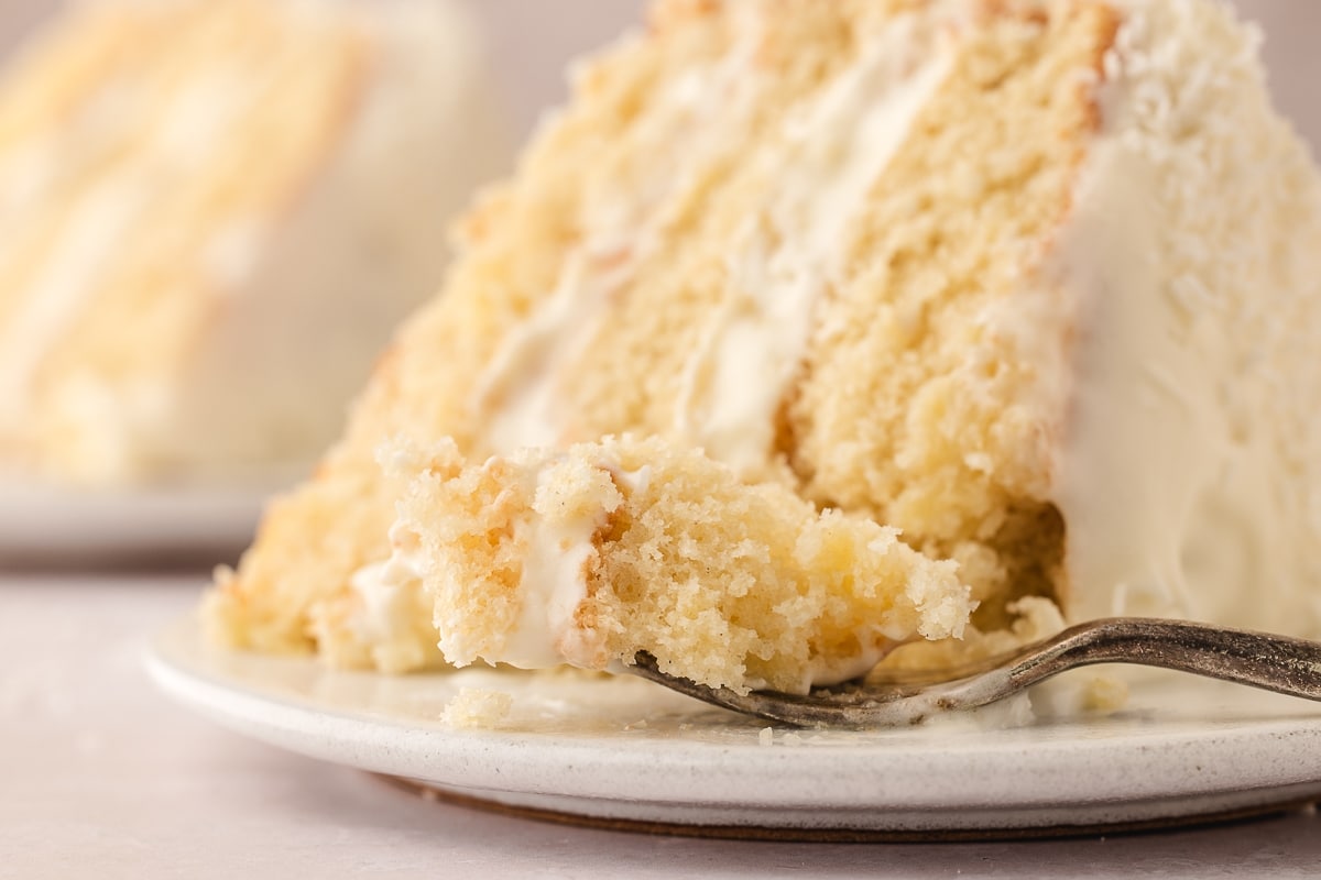 a slice of pineapple coconut cake