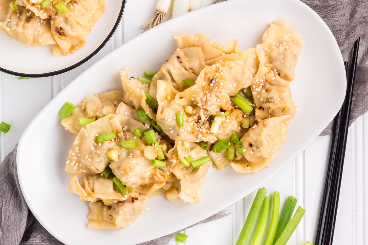 Spice up your meal with these mouthwatering spicy wontons! Made with fresh garlic, ginger, and a blend of seasonings, they're a crowd-pleaser. wonton recipes